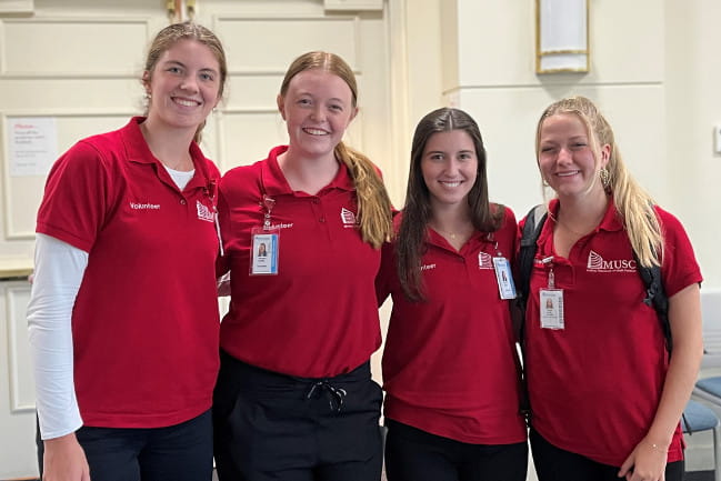 A group of college students who volunteered for the summer with MUSC Volunteer Services.